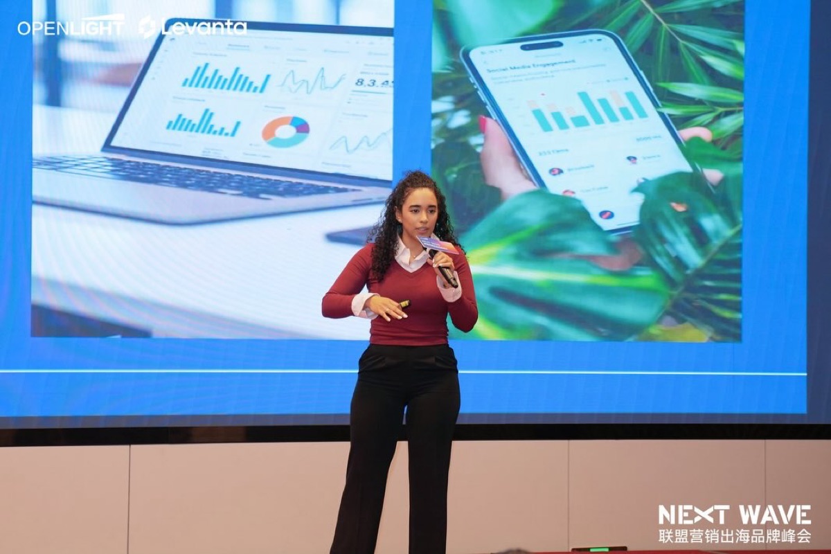 Mary presenting a slide on creator analytics