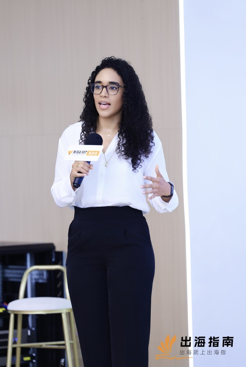 Mary speaking with a microphone